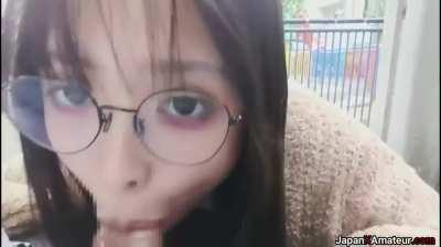 Amateur Japanese Girl With Glasses Giving A Blowjob Outdoors At A Park