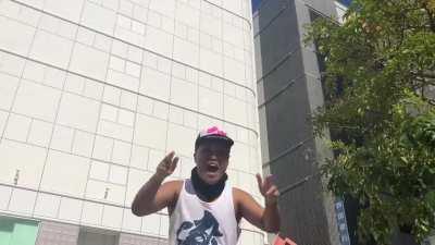 A tank top japanese dancing Boy