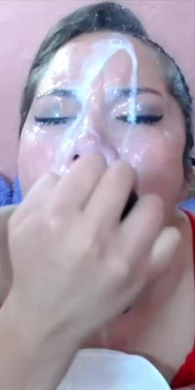 Slut gags herself, and spits in her own face.