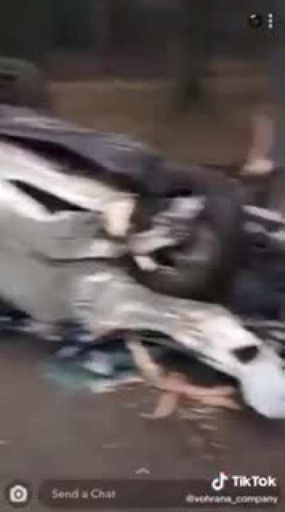 Guy in a wrecked car. Translation in comments