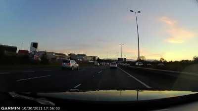 This guy really scared me. I was on the overtaking lane (I live in Ireland) doing the legal 100kph. I looked in the mirror to get back on the middle lane, nothing there. Left turn signal on, started changing lanes, then this happened. I was not aware of h