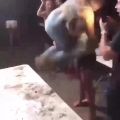 a stupid who broke her friend's rib while trying to break the table.