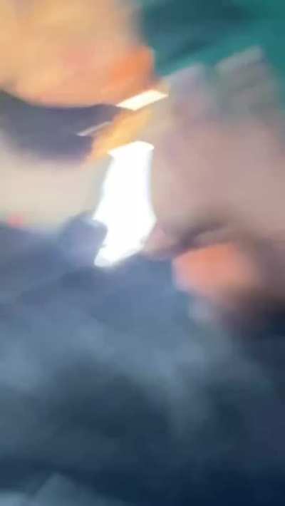 Ebony chick sucking her best friends tits