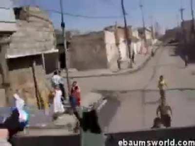 US soldiers taunting thirsty children with a bottle of water