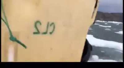 A massive wave caused by an iceberg overturning