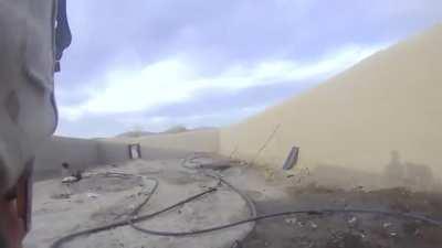 Enemy sniper round misses a US Marine by an inch.