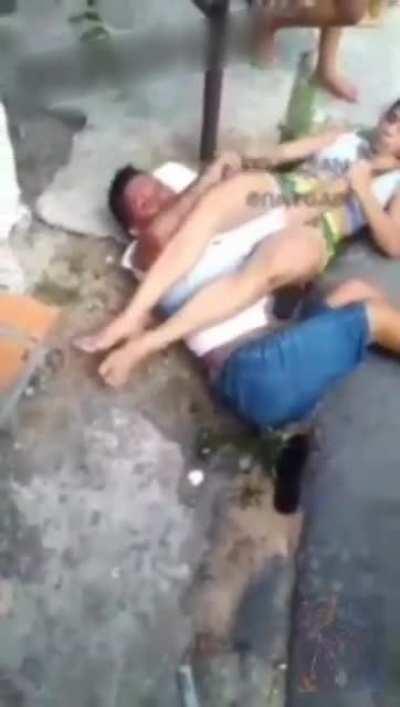 Girl grabs a man in a arm-lock, and threatens to break his arm and fingers