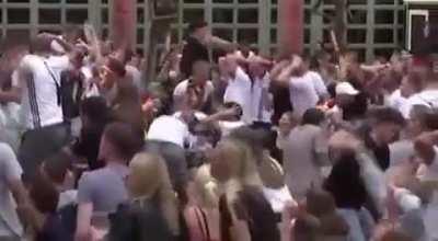 German fans celebrating a chance only for their player to miss it on goal