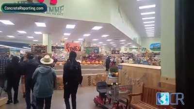 Liberal/Democrat BLM protestors push open Trader Joe's doors to protest inside, remind girl not to thieve since they brought a camera (at 0:29)