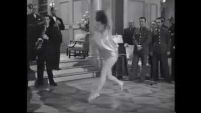 Miriam LaVelle flipping in heels, 1944.