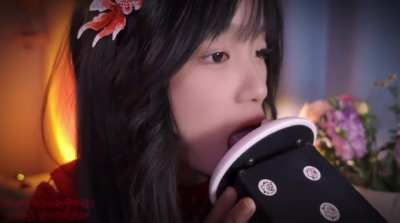 Asian girl ear licking