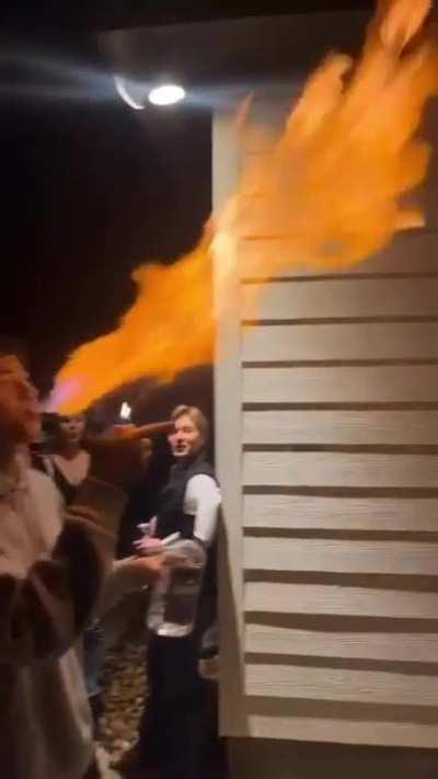 Blowing a fire with vodka