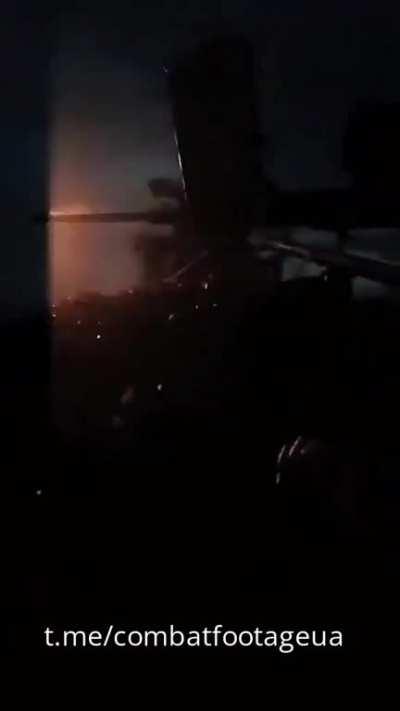 Soldiers from the Georgian Legion fire at Russian positions with a heavy machine gun.