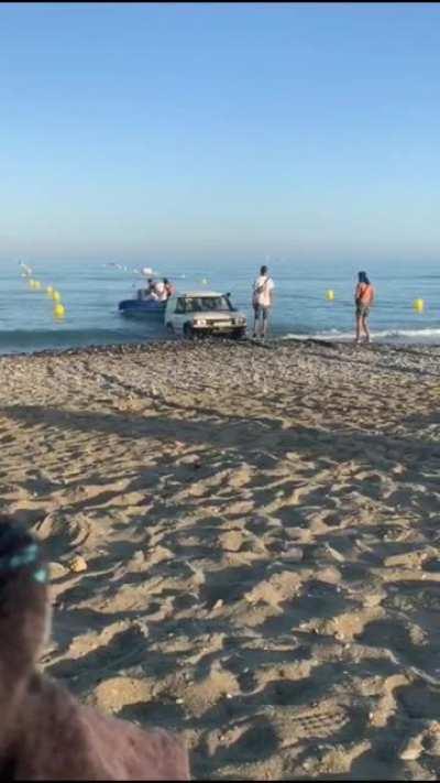 Vehicle sinks whilst launching a boat