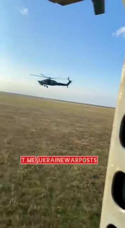 RU pov. MI-28 helicopter in flight over Ukraine