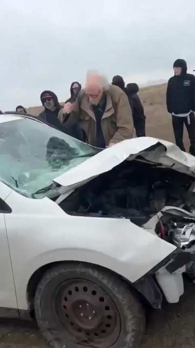 Old man drives toward crowd while having an episode