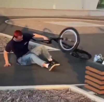 Riding a bike down a huge stair set with no helmet…