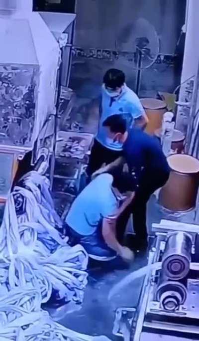 Man gets caught in factory roller and survives