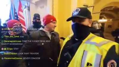Cop taking a selfie with a Trump terrorist inside the Capitol