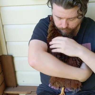Bird rewards kind human with a hug