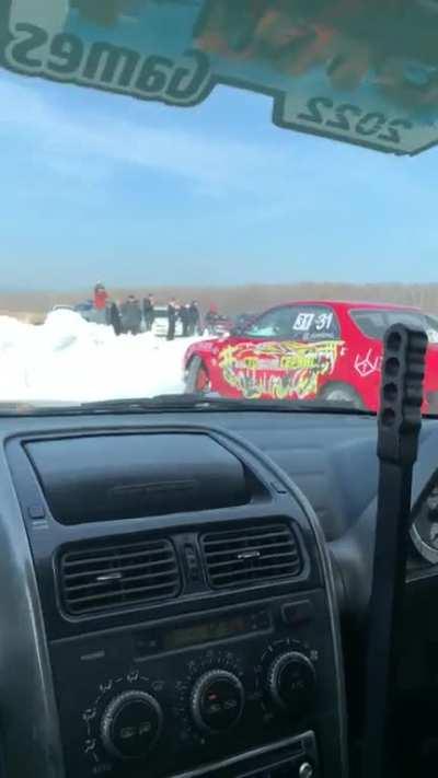 Crazy Russians drift on ice lake