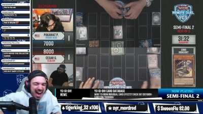 A guy getting excited for his friend popping off at Yu-Gi-Oh!