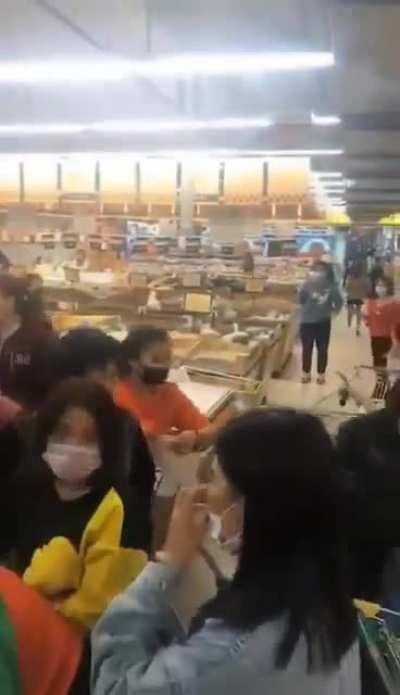China Residents of Shantou, Guangdong province were filmed panic-buying rice even after the lockdown order was later withdrawn by the Shantou government.