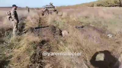 RU POV: Wagner soliders are being trained on how to take out advancing tanks with RPGs.