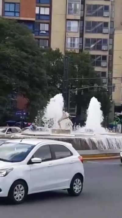 Man humping water fountain