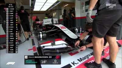 FP1: Haas mechanics recalibrating Magnussen's front-wing angles