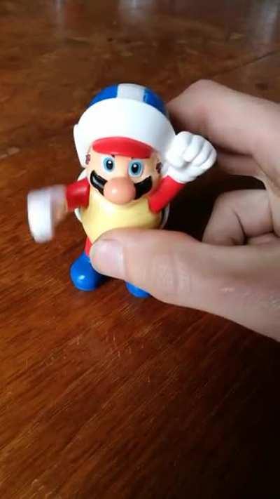 Looking after my mate's kid, and she produced this old Happy Meal toy.