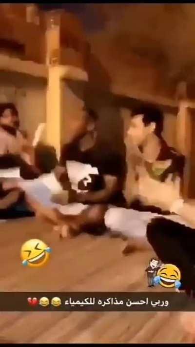 Arab guys studying chemistry