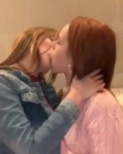 Two Friends Kissing