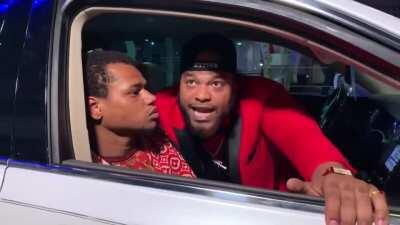 Innocent protestor silently crying for help while being assaulted by friend's stank breath.