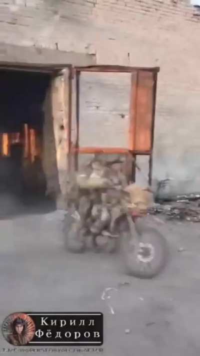 Russian motorcycle troops launching assault (Date and location unknown)