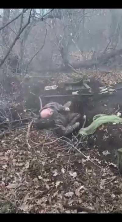 Supposedly execution of a Ukranian (Zero info... maybe someone can translate or shed some light) (Extreme graphic... not a fun video.. I never put warning... hit WARNING)