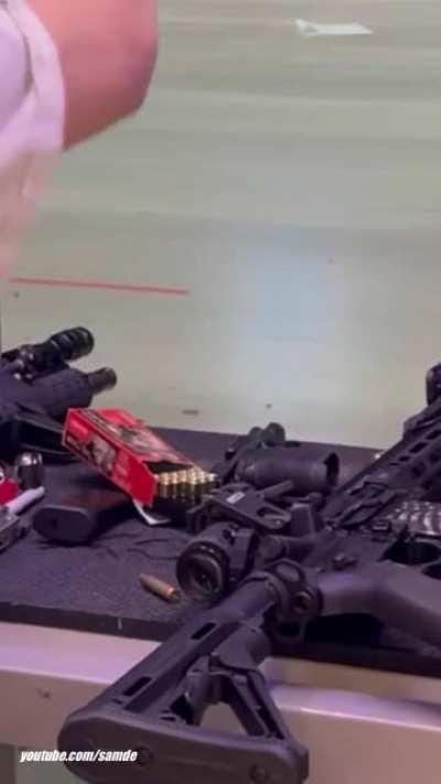 Spent casing bounces off wall and hits primer on table.