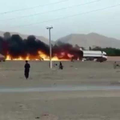 driving burning truck away from city