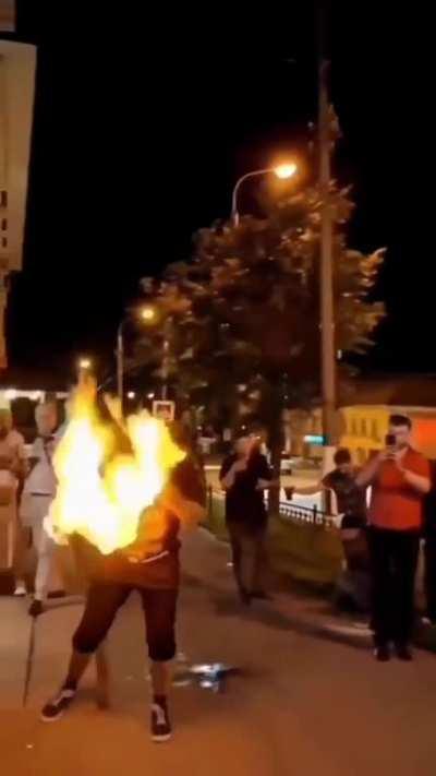 throwing flames while having a bushy beard