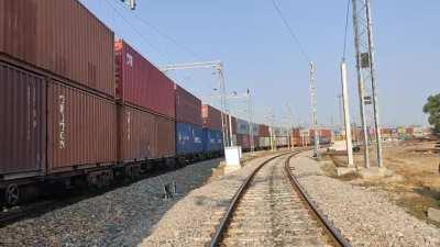 Indian Railways WAG 12 #60145 slowly accelerating with double stack container.