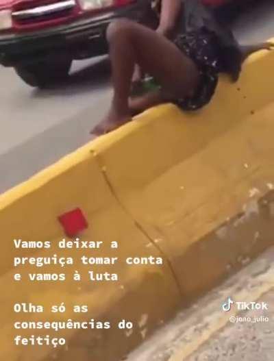 Woman masturbating in public in Angola.
