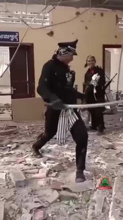 Soldier confiscates a sword