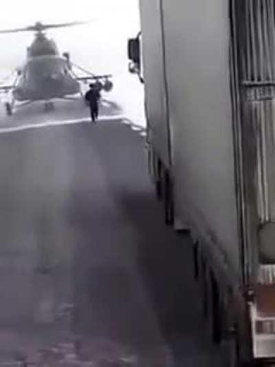 Russian helicopter pilot lands on road to ask for directions