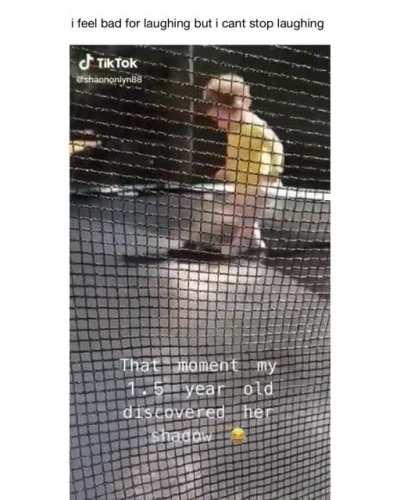 Kid discovers her shadow...