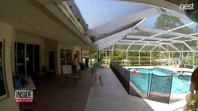 father saves son from drowning.