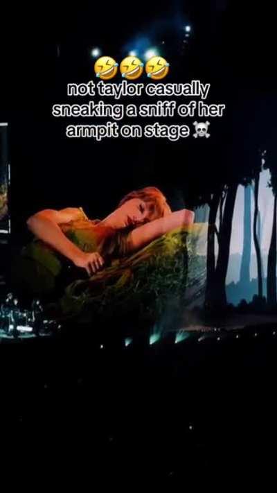 Taylor Swift sniffing her armpit