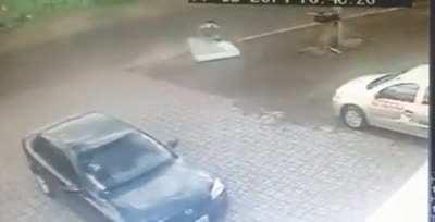 WTF moment. Cyclist hit by car and saved by mattress thrown off the car.