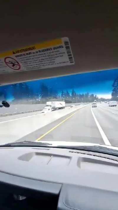 Driver on wrong side of freeway crashes into a semi truck.