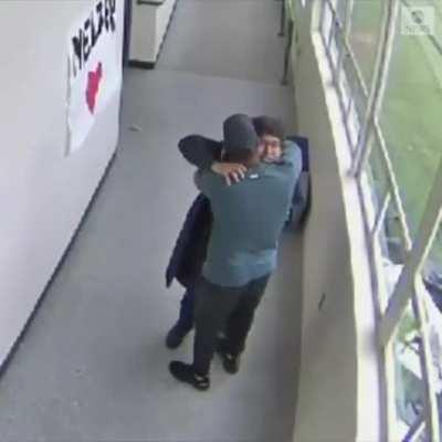 Coach disarms and hugs school gunman.