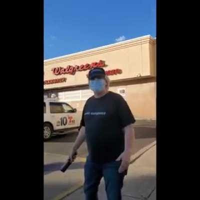 Undercover Cop Caught Clearly About to Throw a Bottle at Police During a Protest